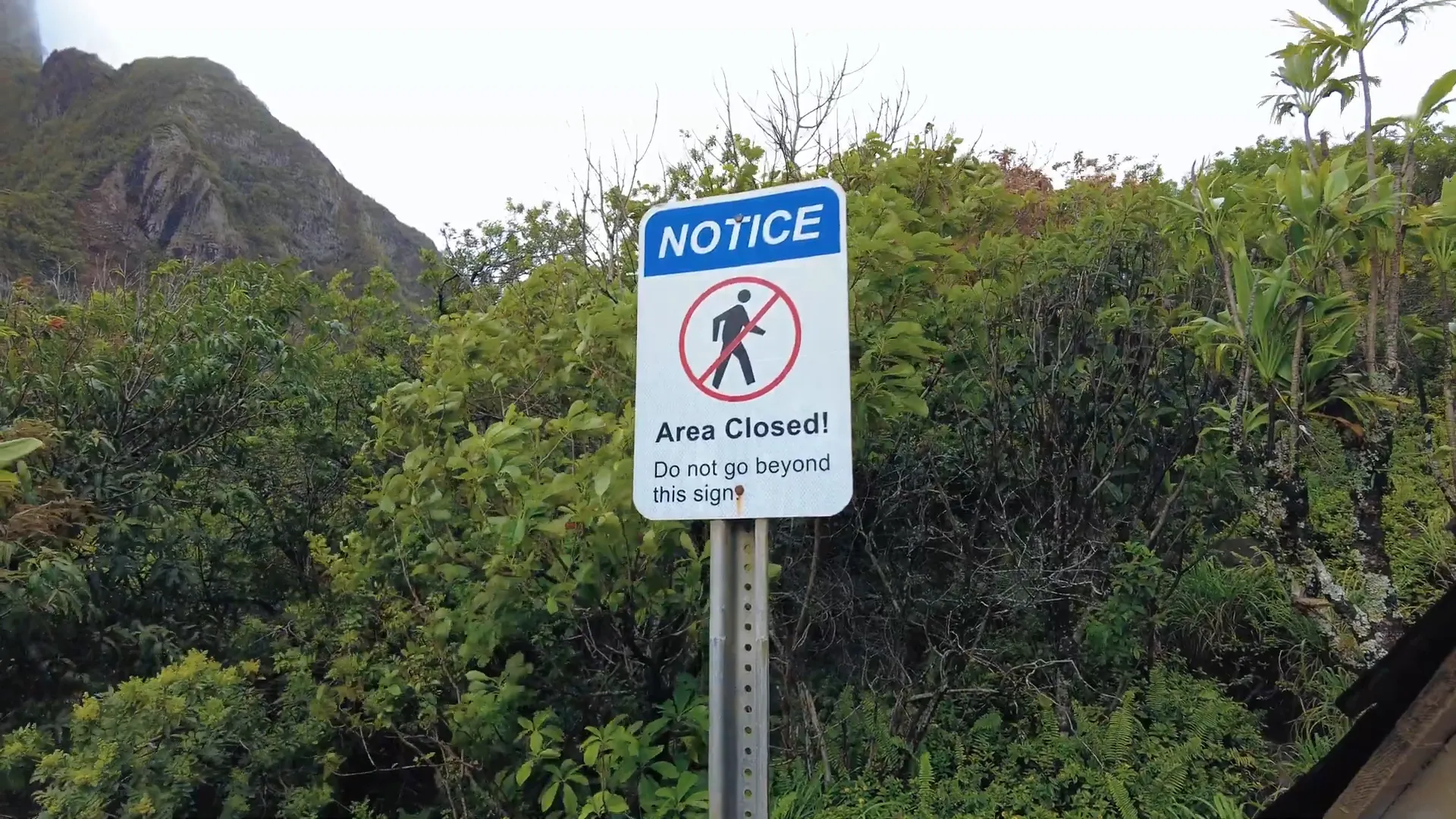 Closed hiking trail sign
